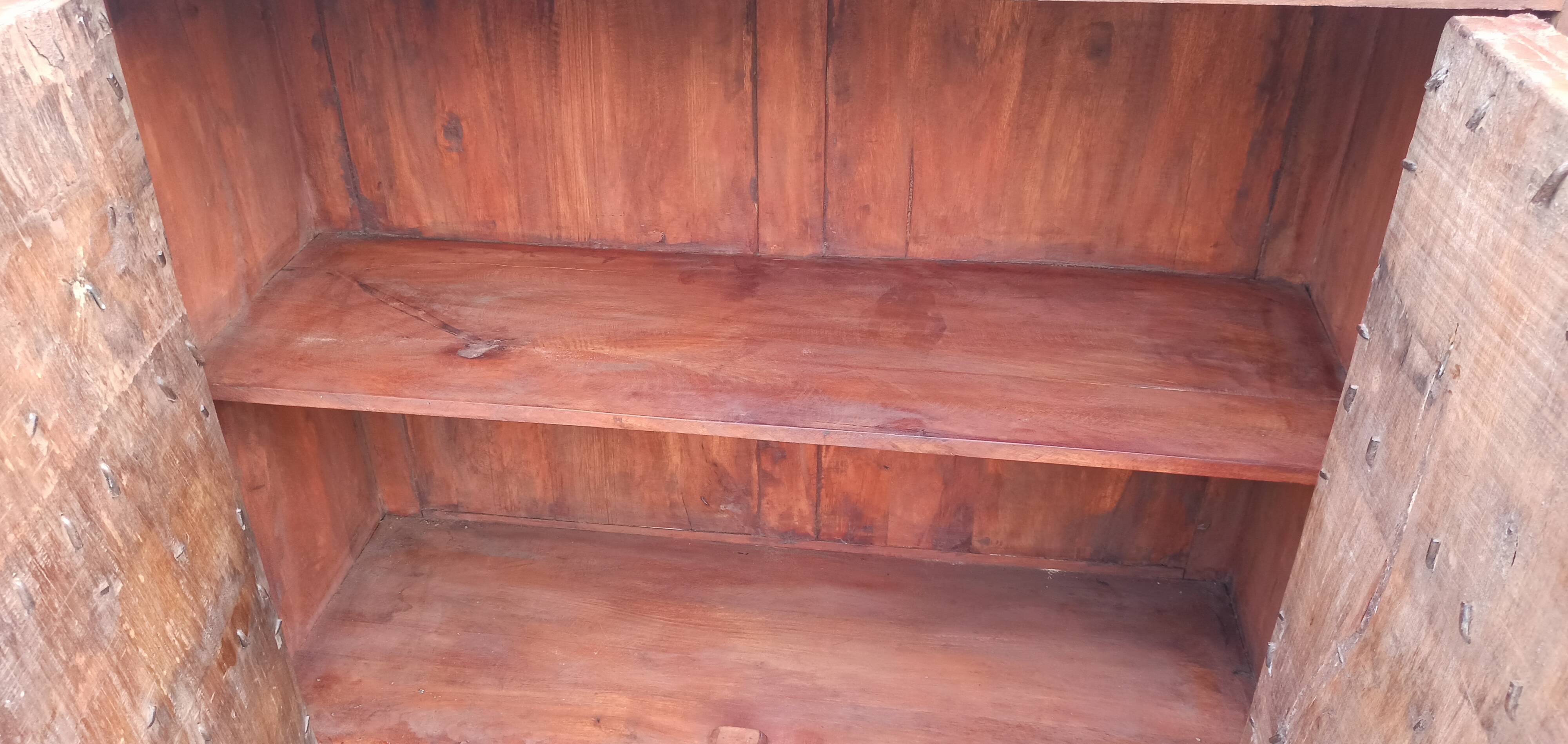 Small old wooden sideboard with two doors