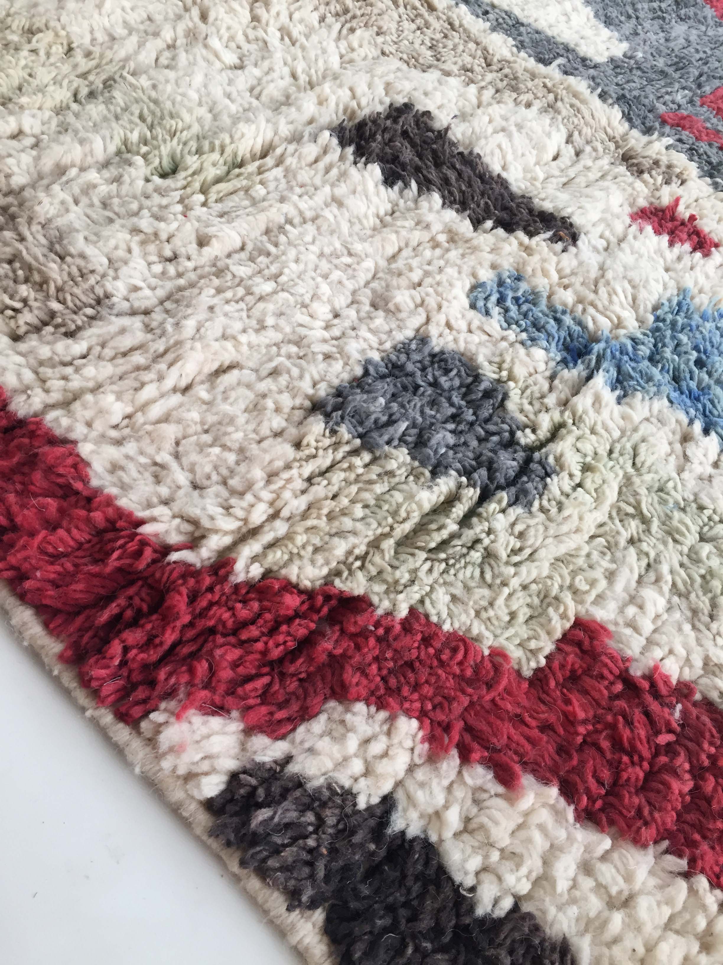 Moroccan Berber carpet Boujaad ecru with colorful patterns 228x157cm