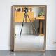 Miroir biseauté doré 93x64 cm