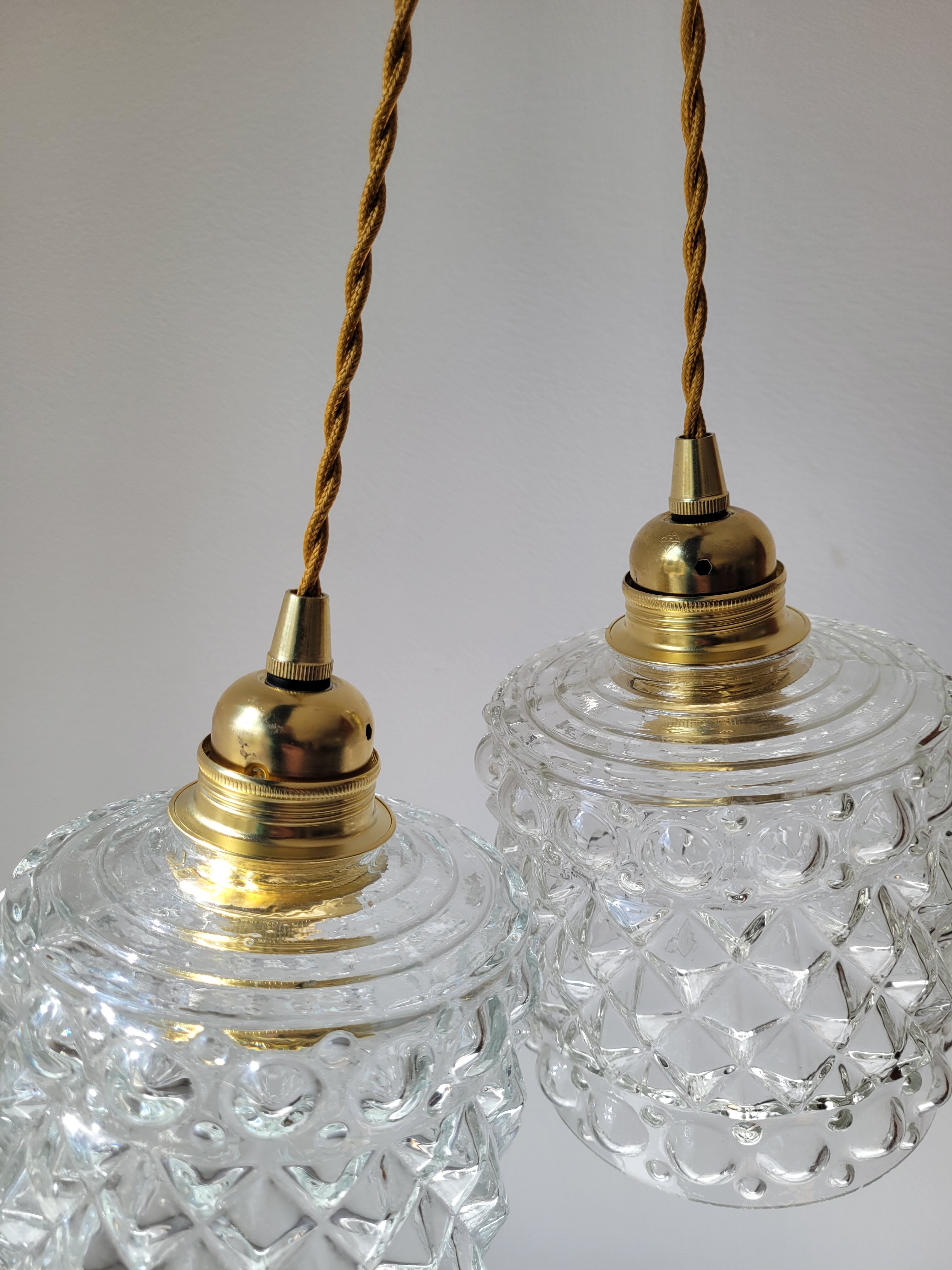 Duo of molded glass pendant lights