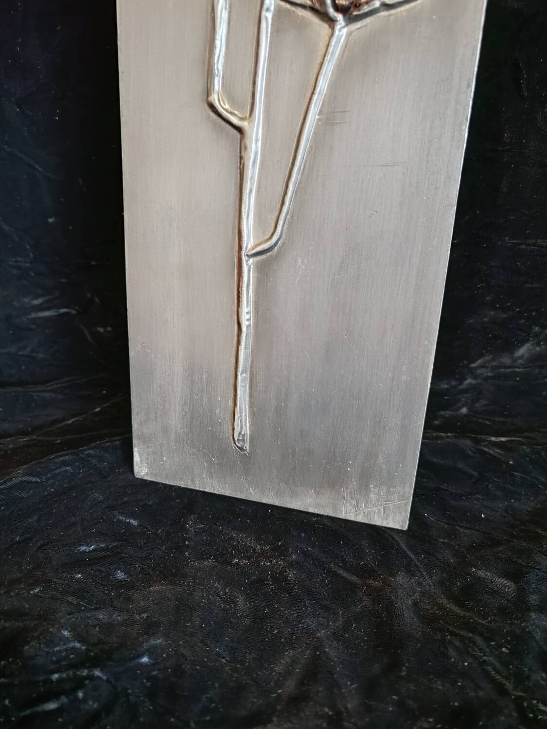 Bas-relief in embossed tin