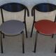 4 gondola-style chairs with a sturdy metal frame and faux leather.