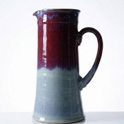 Large artistic stoneware vase by Lévéjac Michel Goldstyn, with flamed oxblood glaze.