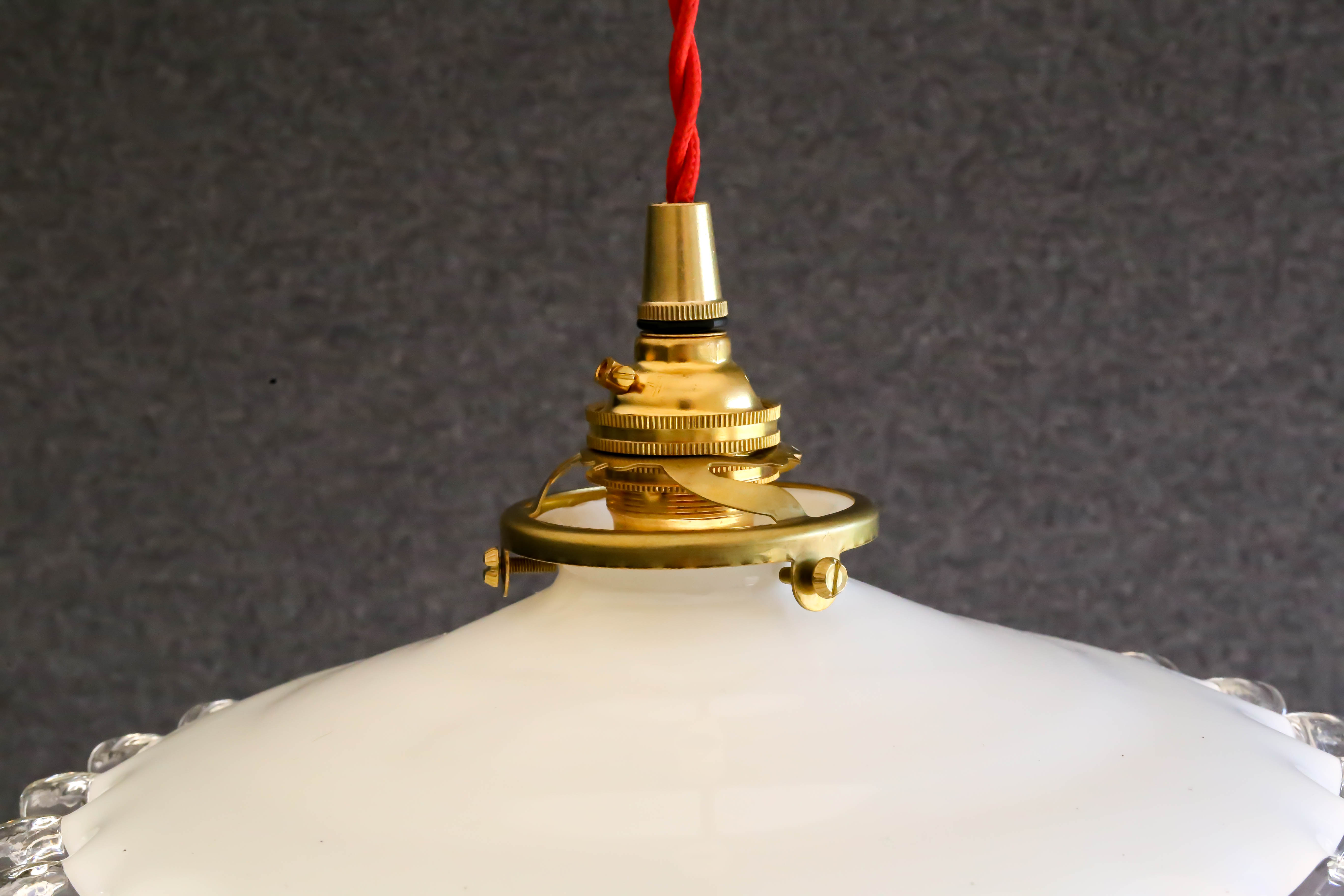 White opaline pendant light with crenellated edges