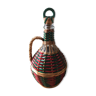Demijohn carafe dressed in painted wicker