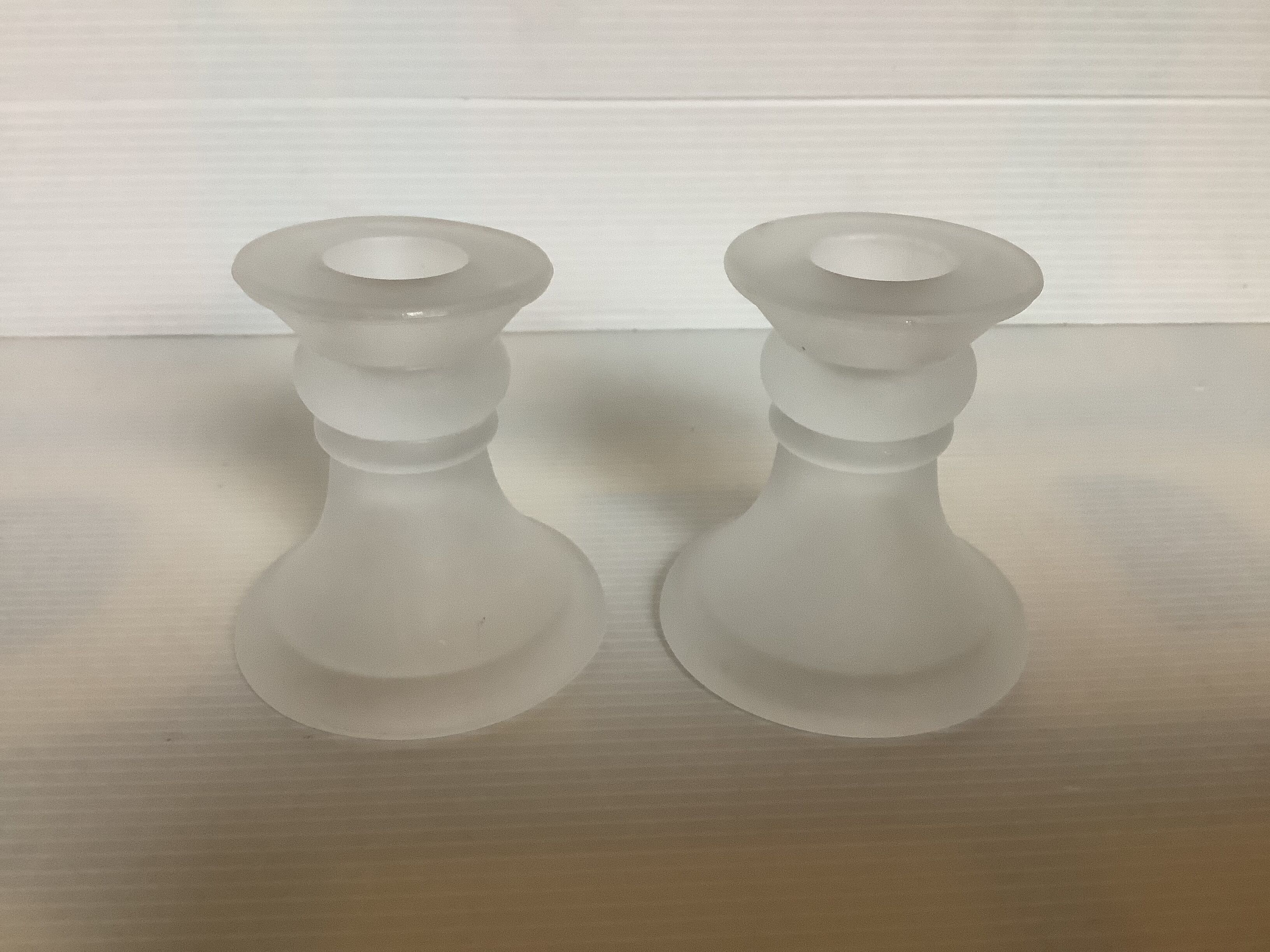 Pair of frosted glass candle holders