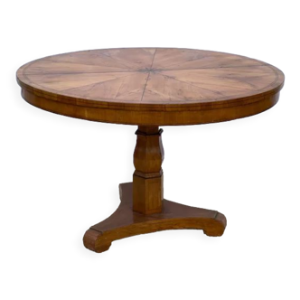 Tilting plate pedestal table