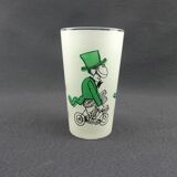 Glass illustrated by Cabu on the theme of the circus, 3 learned monkeys on a bike, green