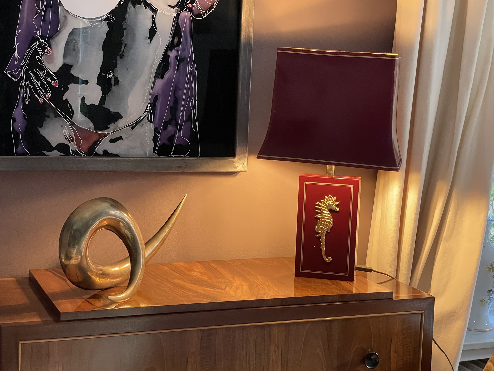 Pair of table lamps in Bordeaux lacquered wood and brass seahorse