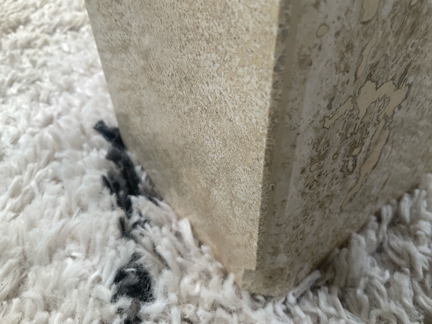 Large vintage dining table in travertine in the 1970s Carpa style.