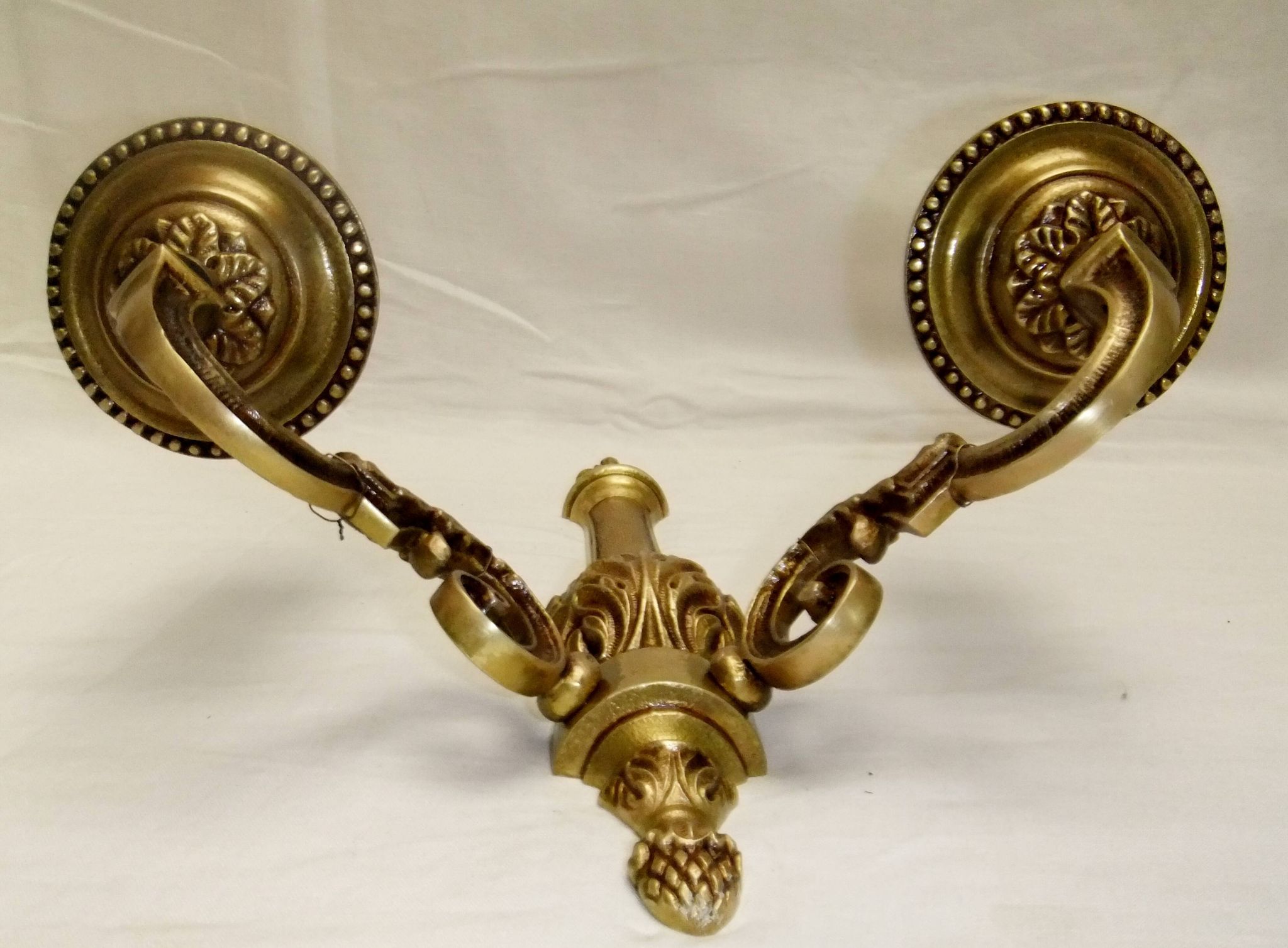Old bronze double candle holder wall light