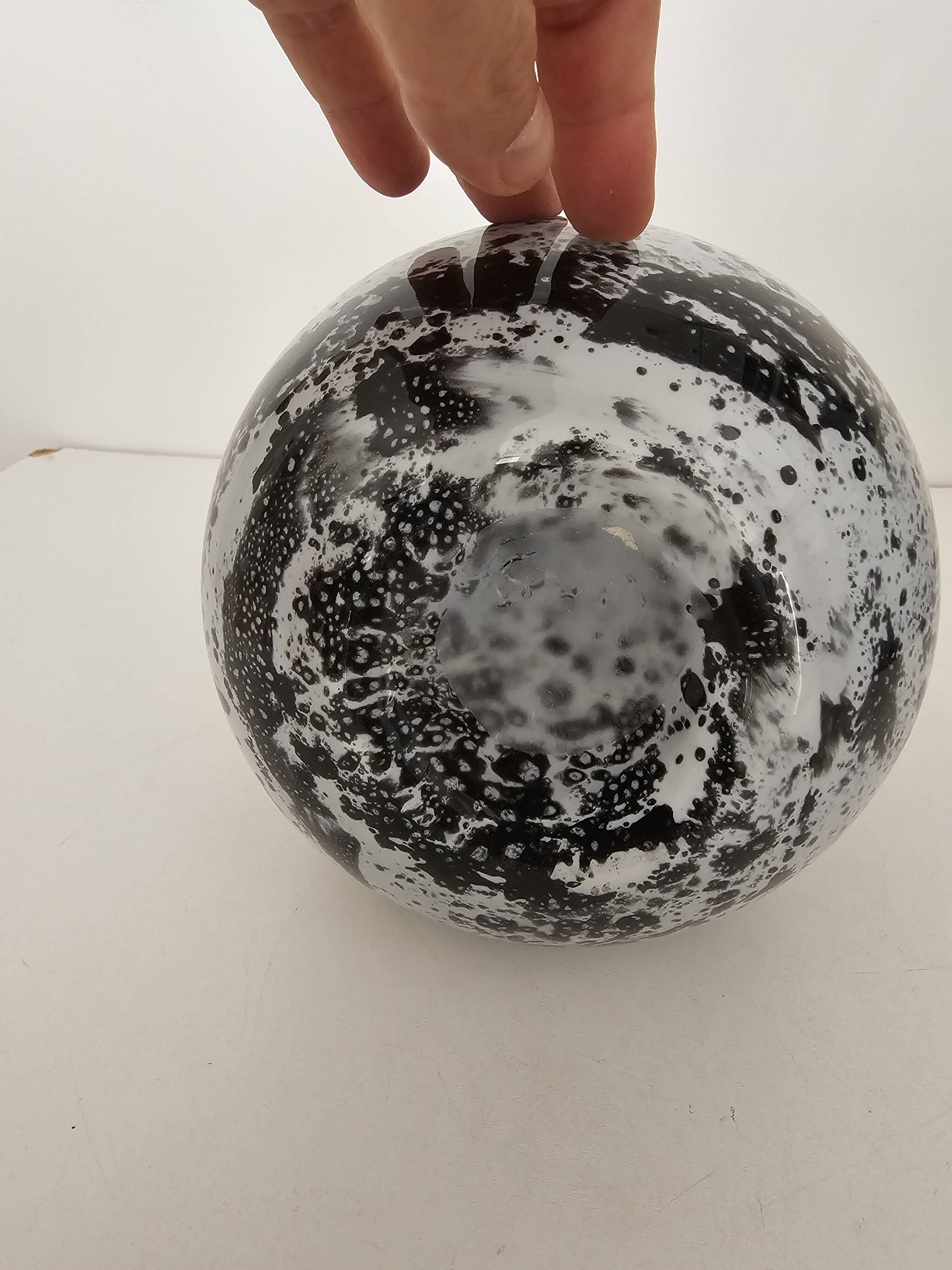 Blown glass vase with black snake decoration with white speckles