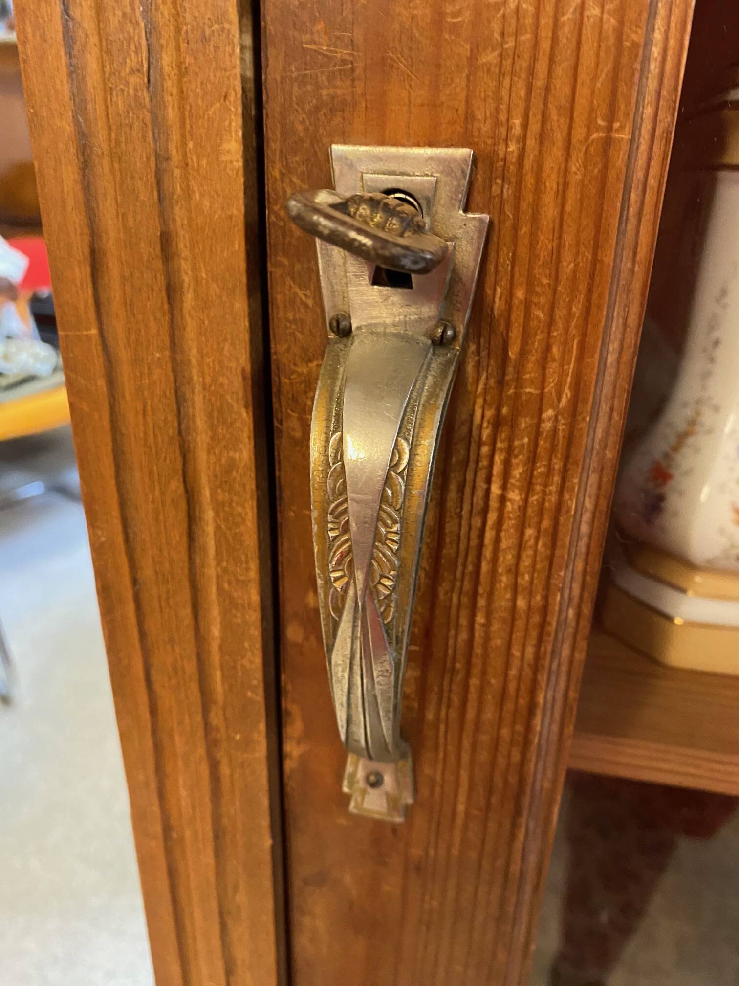 1940s school library in light oak with glass door and shelves