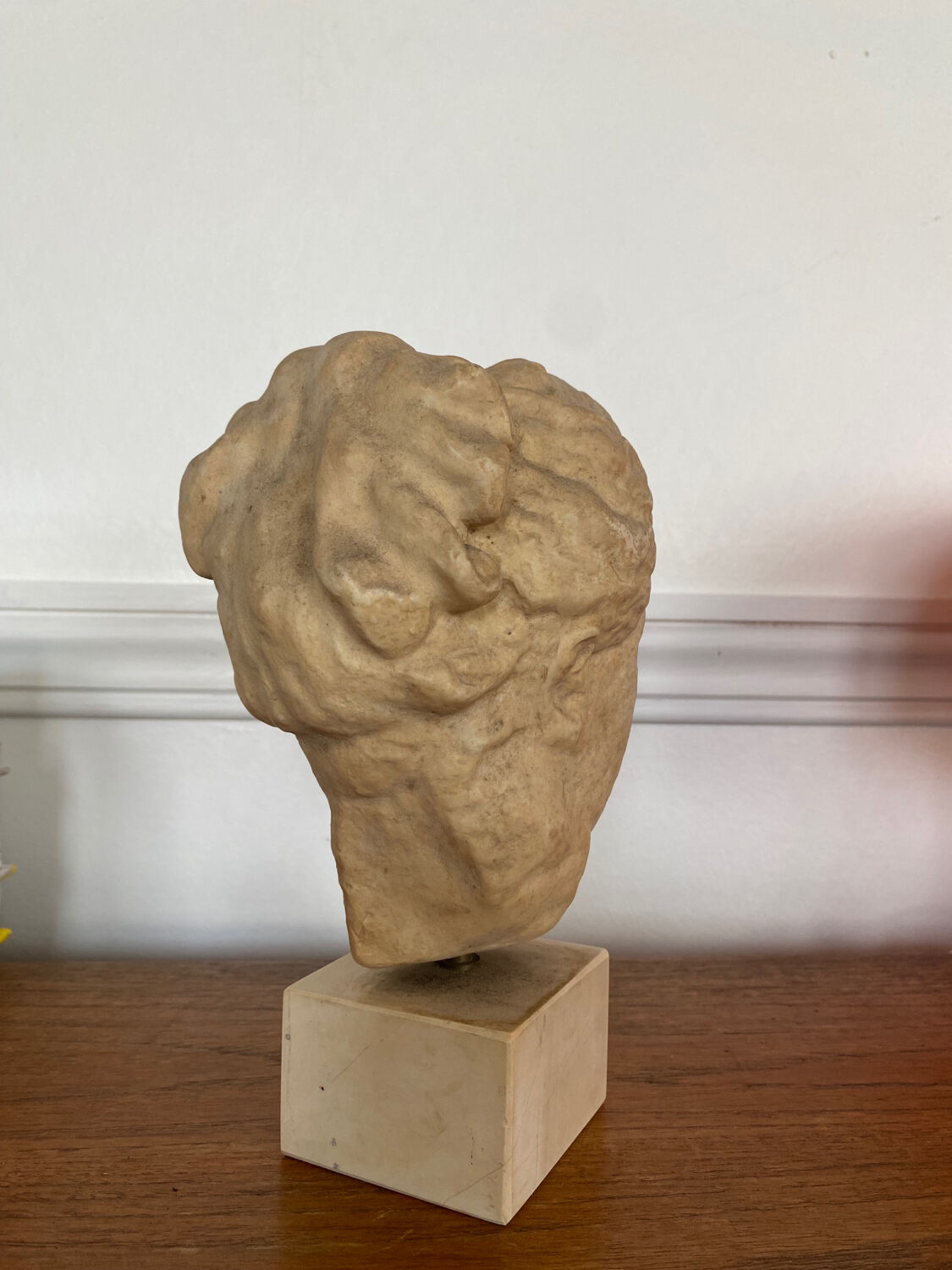 Head of a greek goddess in stone