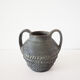 Vase with double handle in black sandstone