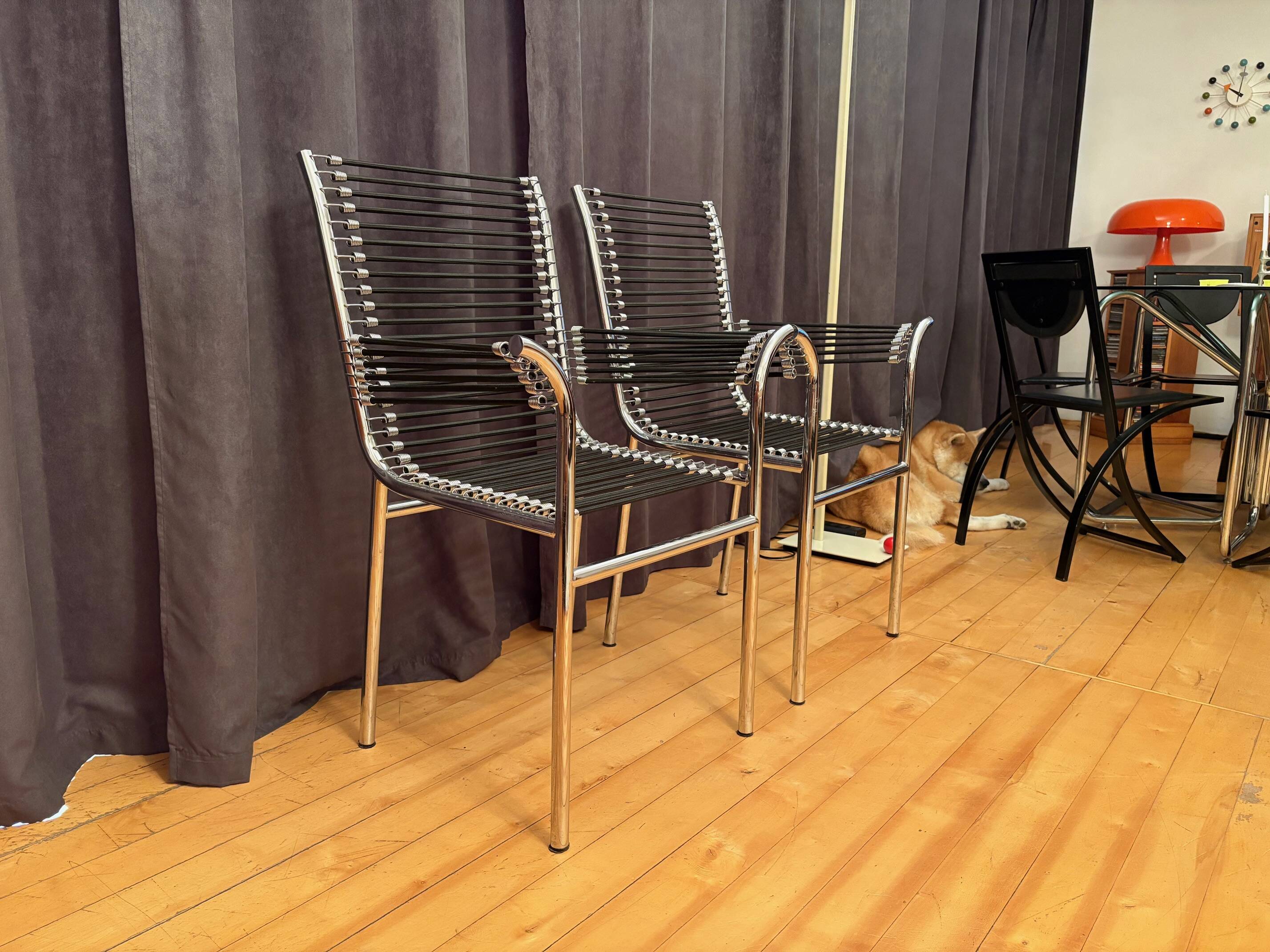 Pair of "Sandows" chairs designed by Rene Herbst, Bauhaus, France, 1980s