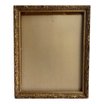 Old golden colored wooden frame