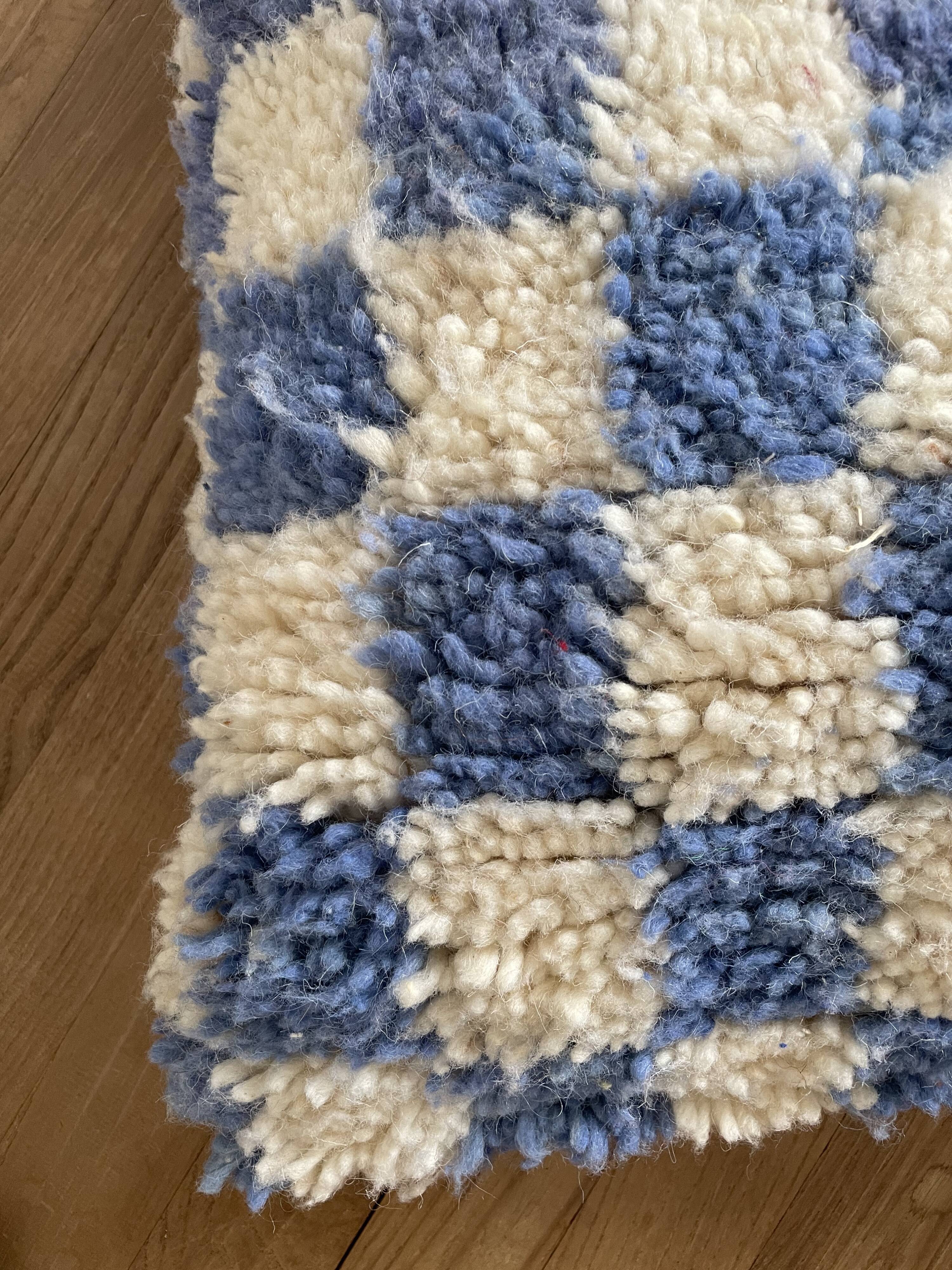 Sky blue and white checkered wool cushion
