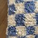 Sky blue and white checkered wool cushion