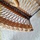 Vintage wicker and metal magazine rack
