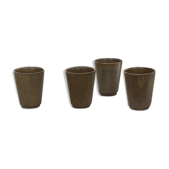 4 old sandstone cups