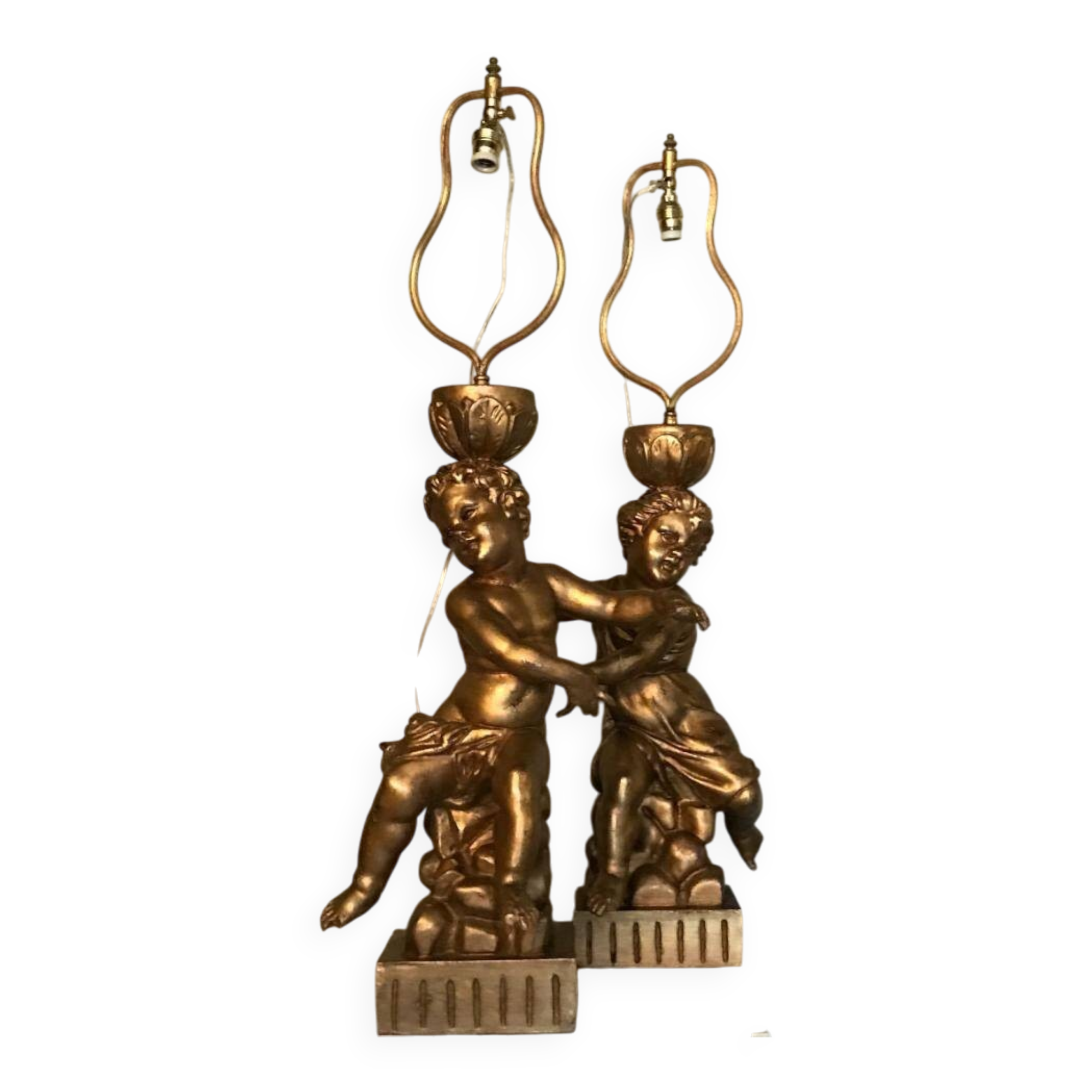 Deux enfants en bois sculpté doré, lampes de table