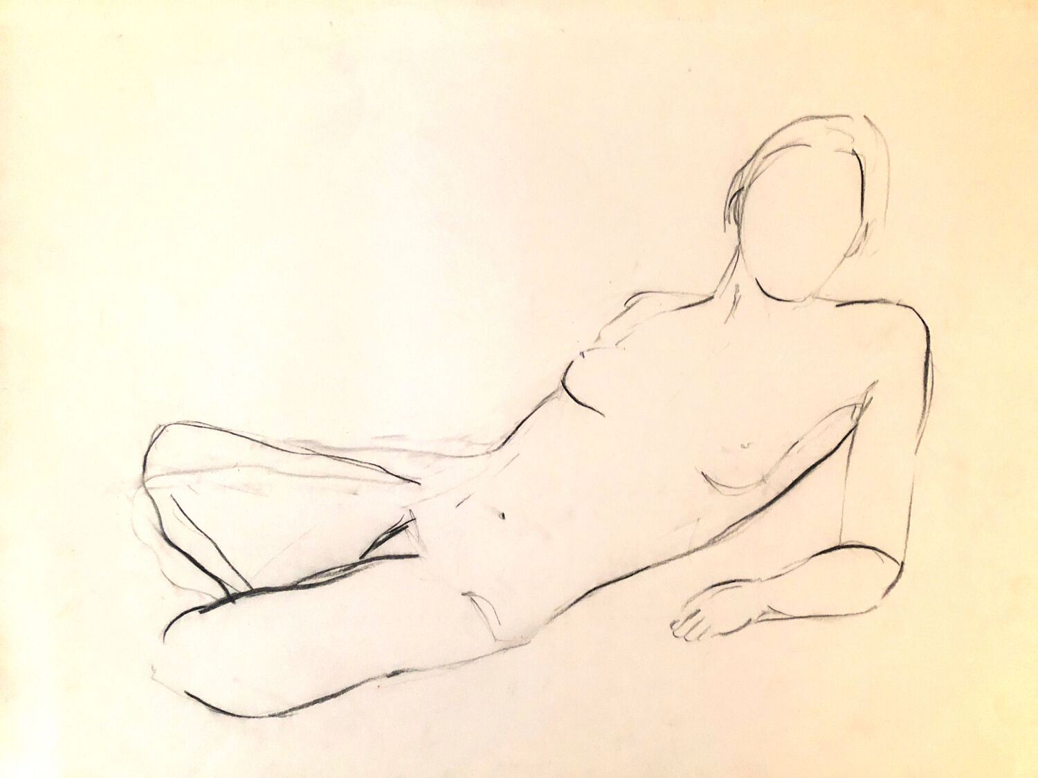 Drawing nude in charcoal on paper
