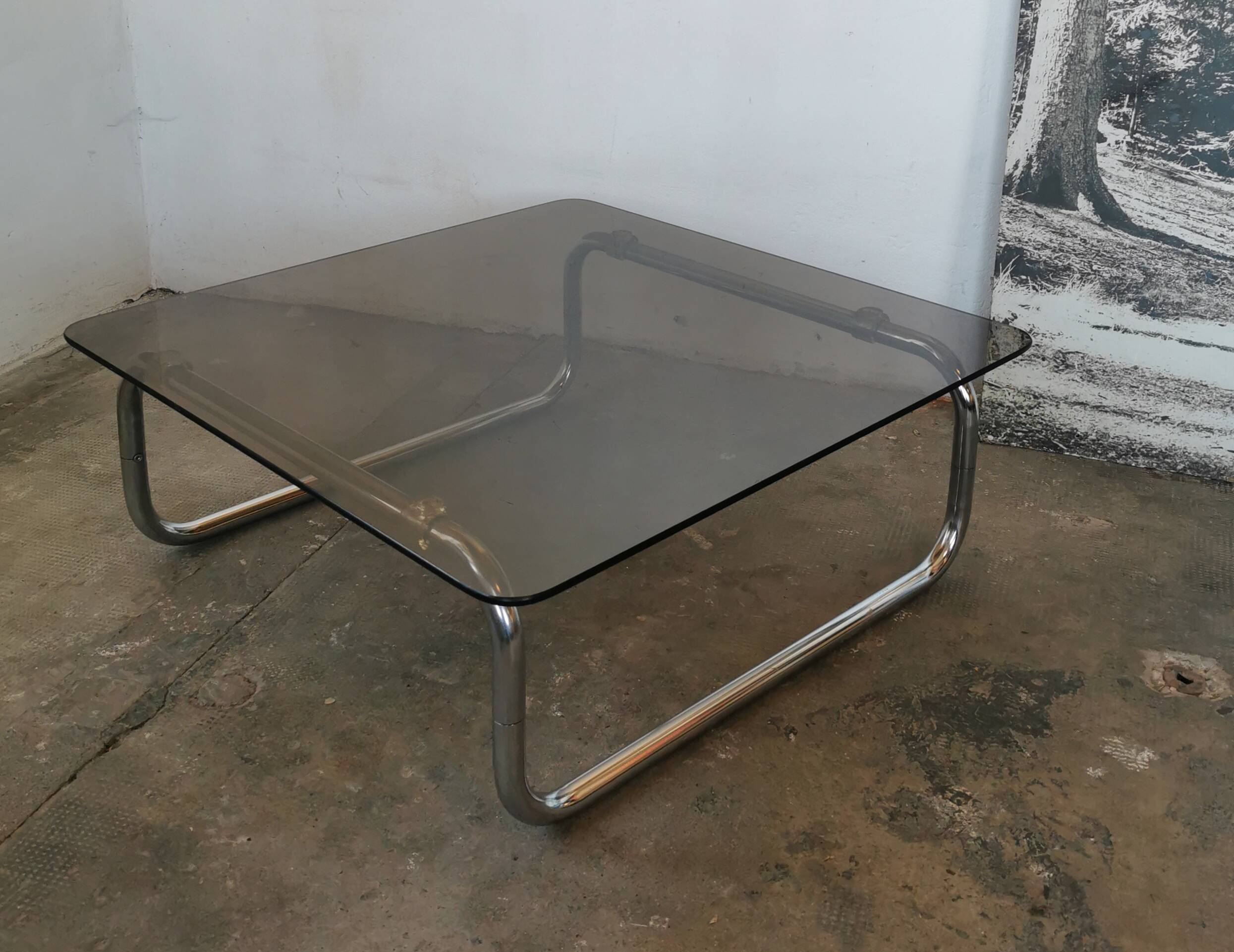 Chrome tubular metal and smoked glass coffee table