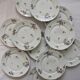 10 assiettes plates vintage fleuries en porcelaine Haviland