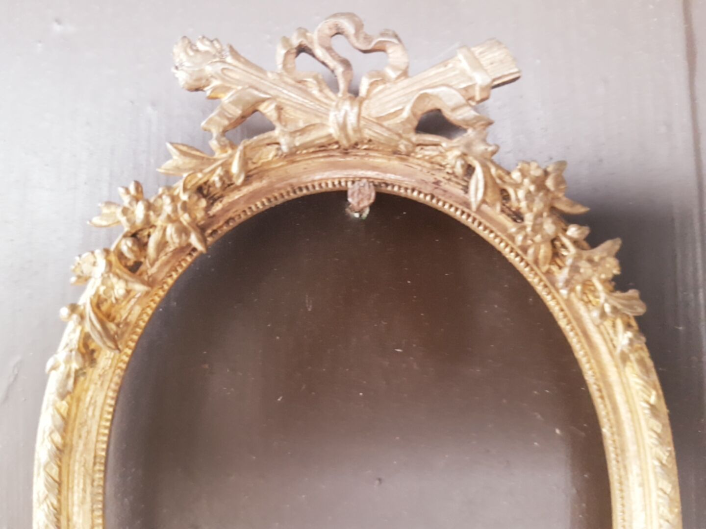 Old bronze oval format frame