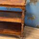 antique mahogany three-tiered étagère