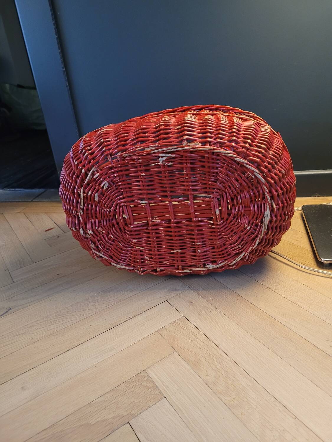 Red painted rattan basket