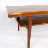 Coffee table with shelf in teak of danish design from the 1960s.
