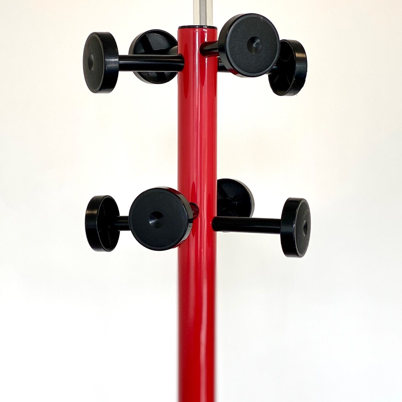 Vintage red metal coat rack