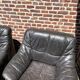 Pair of patinated leather club armchairs