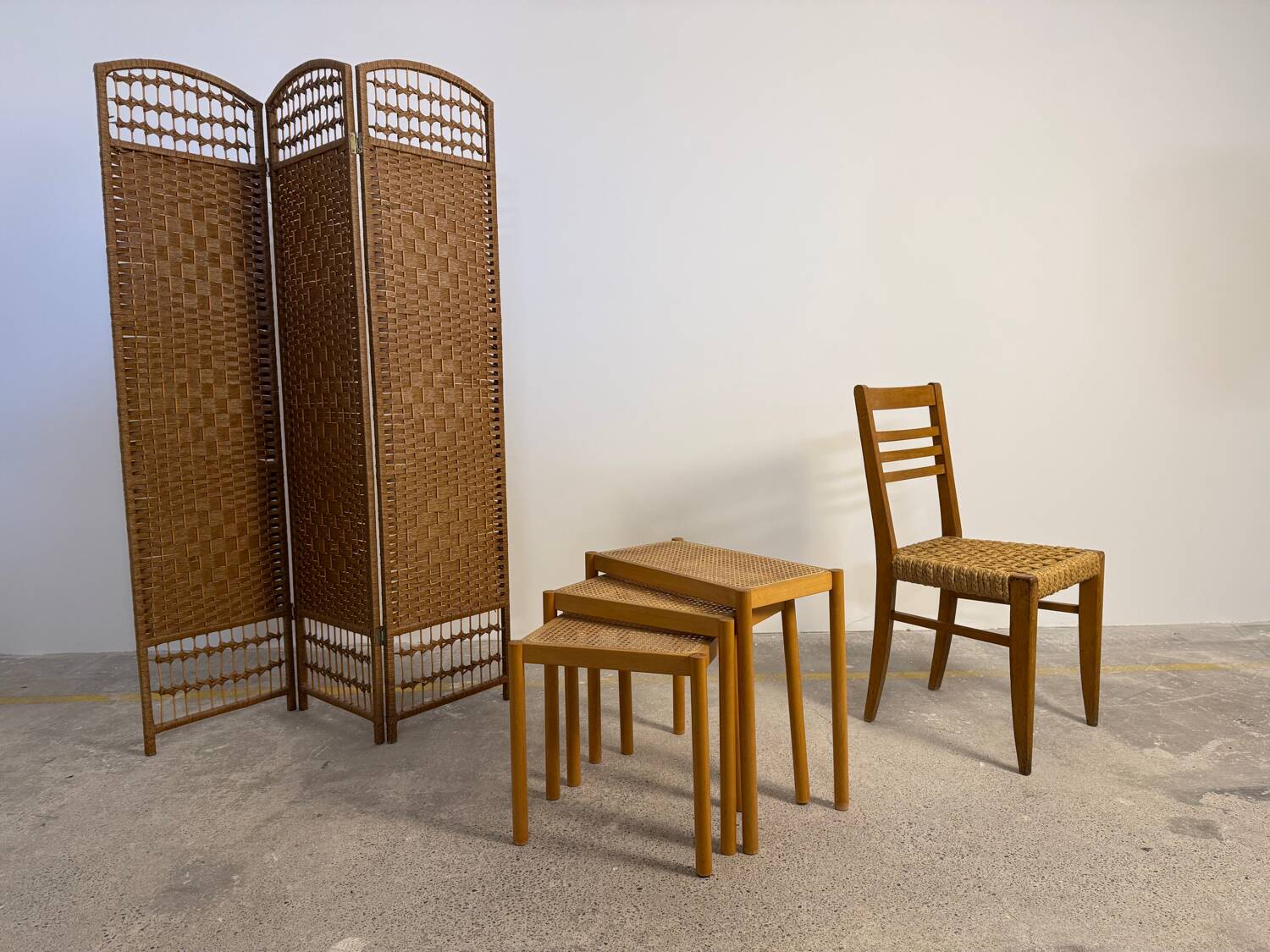 Set of Scandinavian nesting tables in wood and cane – 1960s