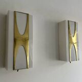 Pair of Loewy wall lights for Hilton, brass and Perspex, France 1965