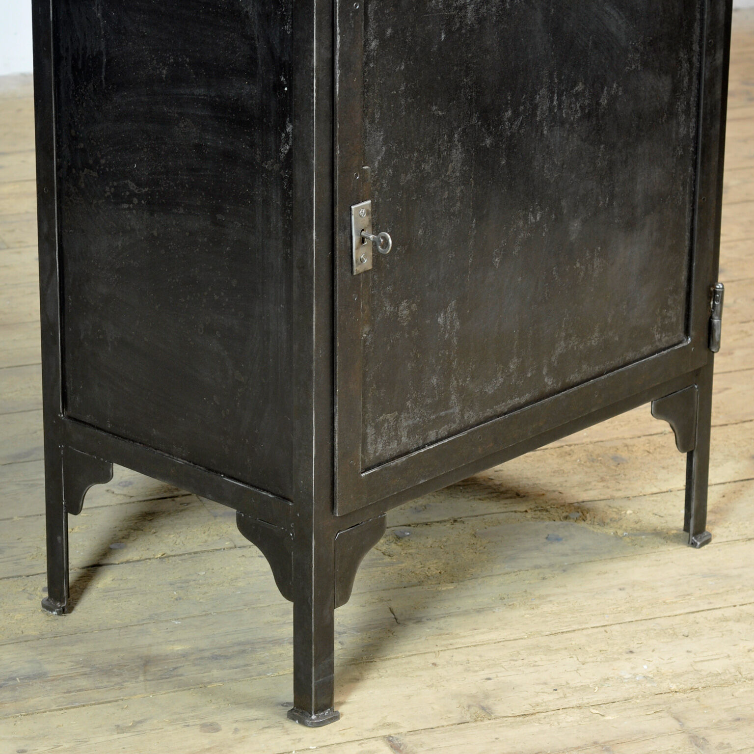 Polished iron medical cabinet, 1930s