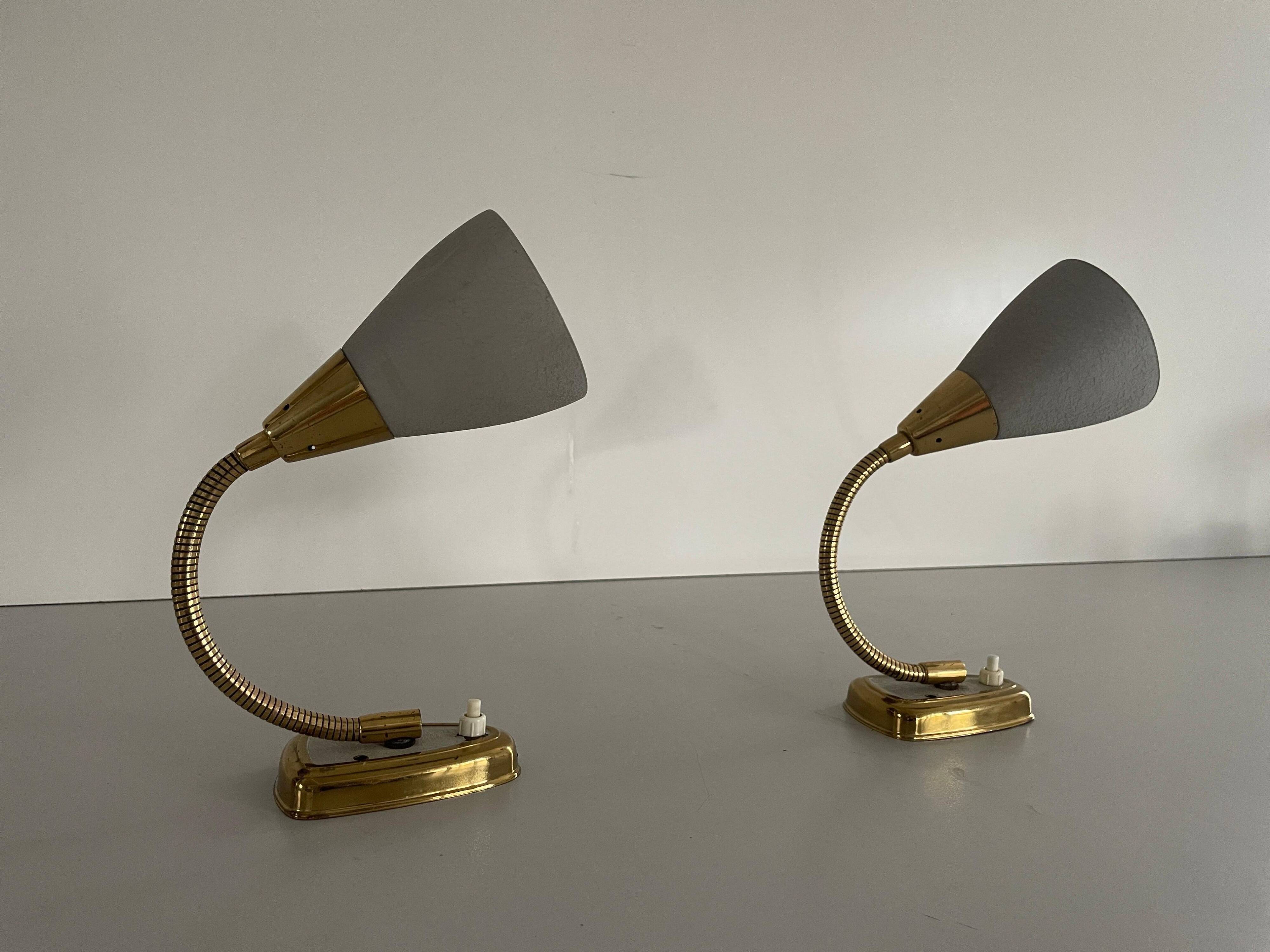 Pair of grey metal and brass wall lights, 1960s, Germany