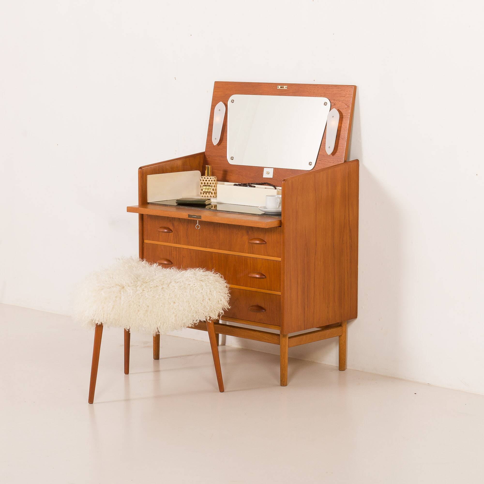 Danish teak dresser with hidden vanity and lights, 1960s