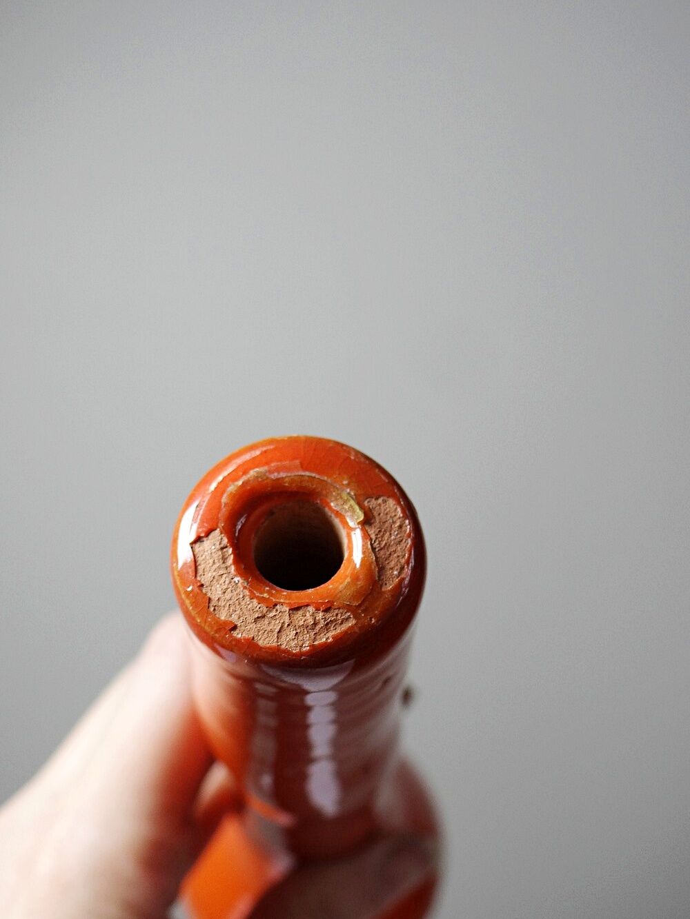 Bright orange mid-century decorative bottle lamp base glazed pottery.