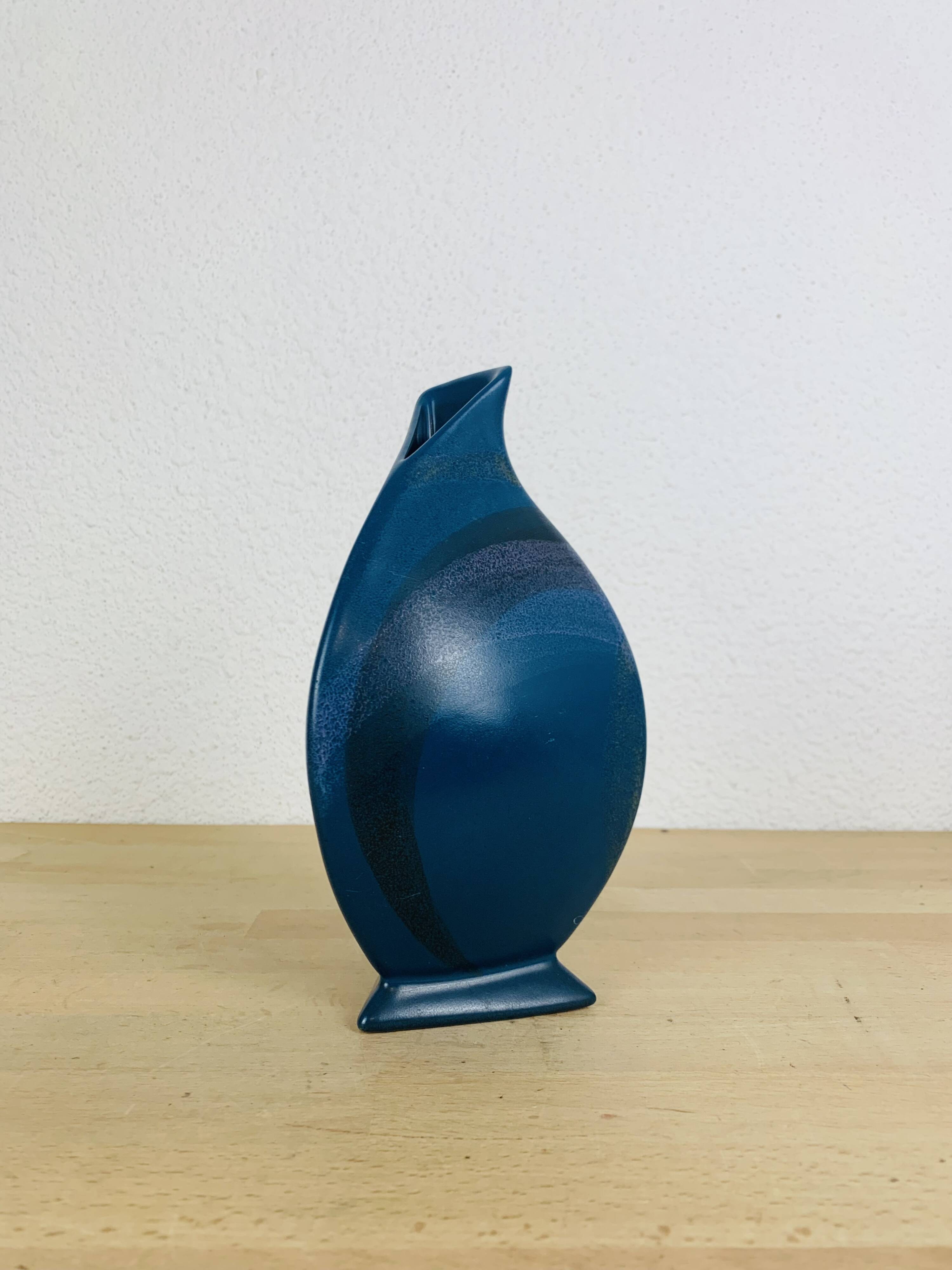 Blue ceramic vase, triangular and pot-bellied