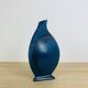 Blue ceramic vase, triangular and pot-bellied