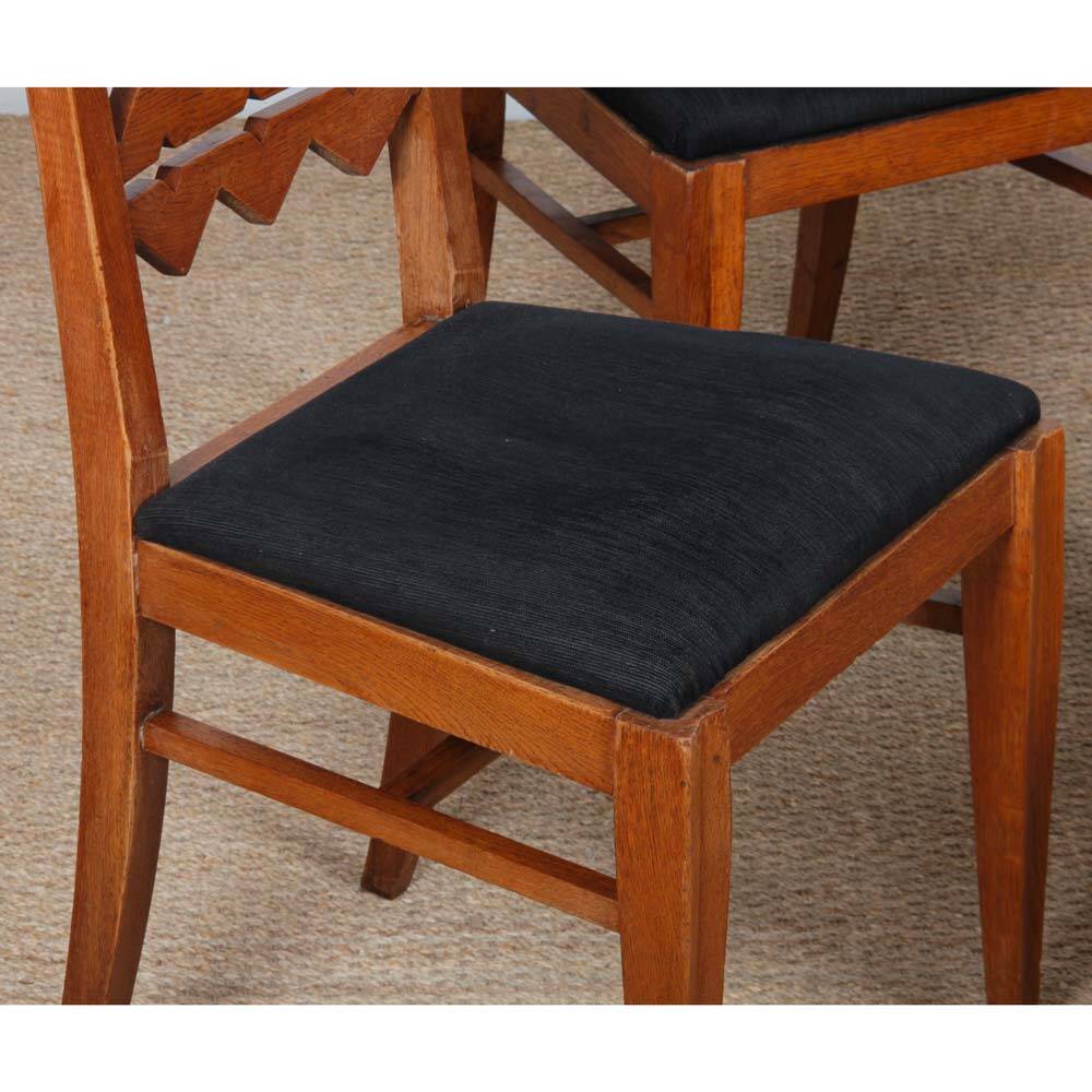 Set of 4 solid oak chairs from the 1950s.