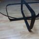 Design round glass coffee table, crossed legs