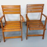 Vintage garden furniture set consisting of a table with extensions and 4 armchairs