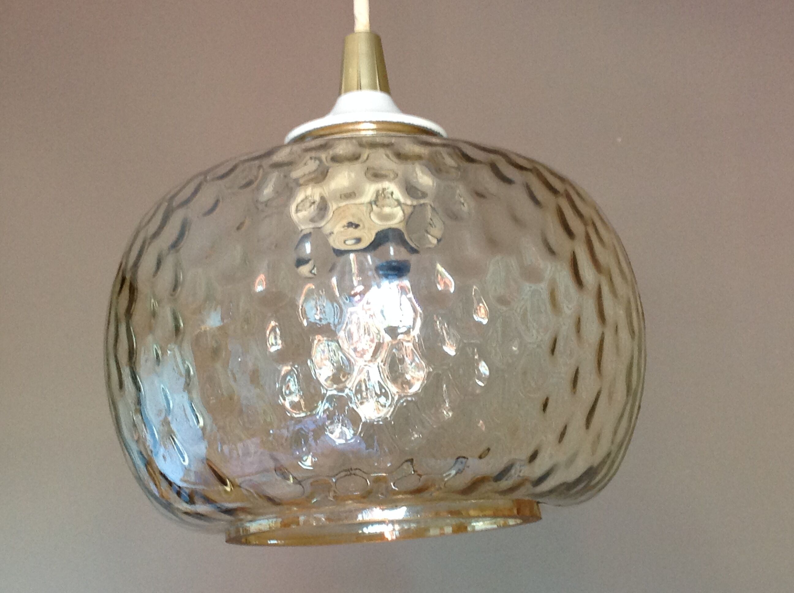Globe pendant lamp in bubbled amber glass / vintage 60s-70s