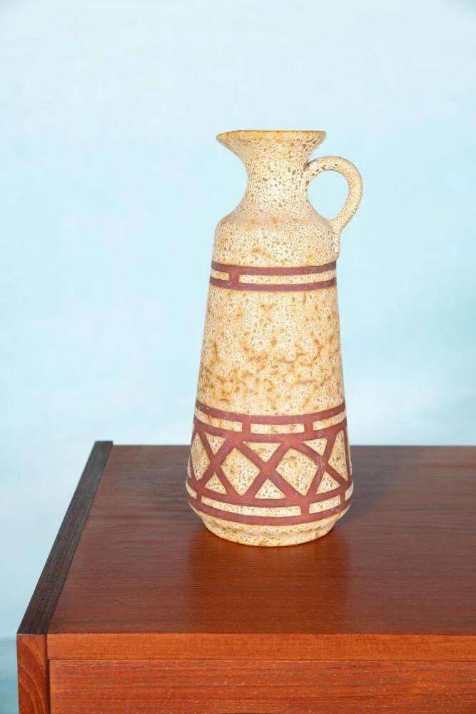 Vintage vase from the 60s, W-Germany footed vase in caramel yellow.