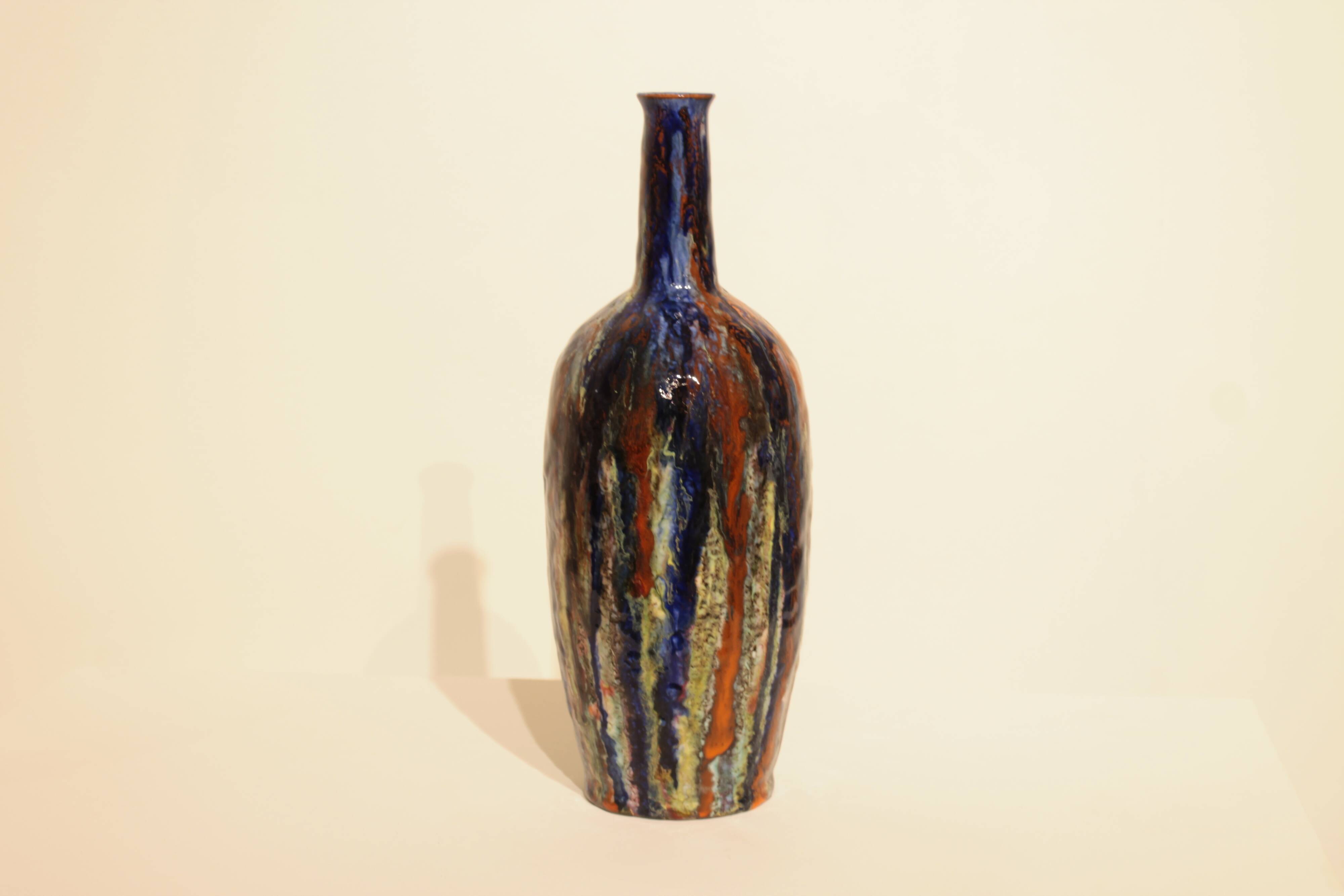 Multicolor glazed ceramic vase signed