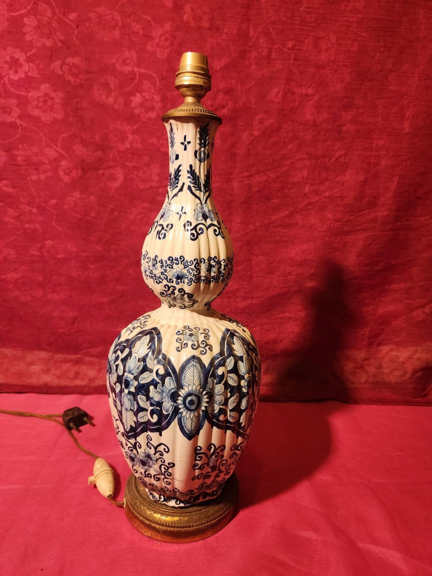 Antique ceramic lamp with brass or bronze base from the attic